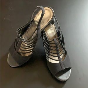 Black heels stretch fabric.